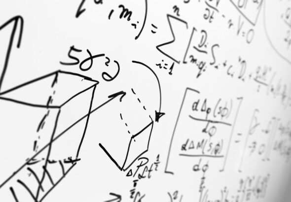 Complex math formulas on whiteboard. Mathematics and science with economics